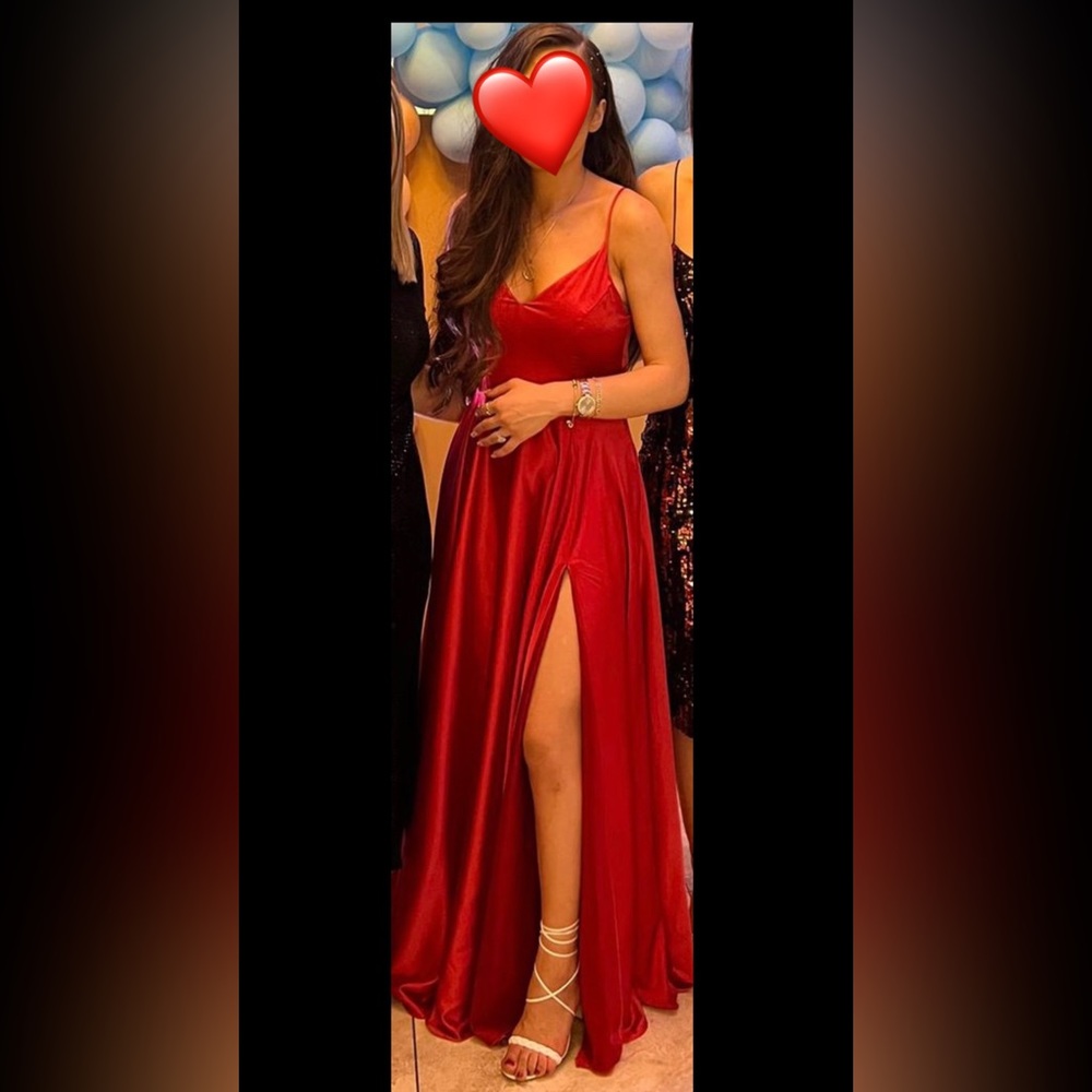 B. Darlin
V-Neck Spaghetti Strap Princess Seam Side
Slit Flounce Satin Ball Gown